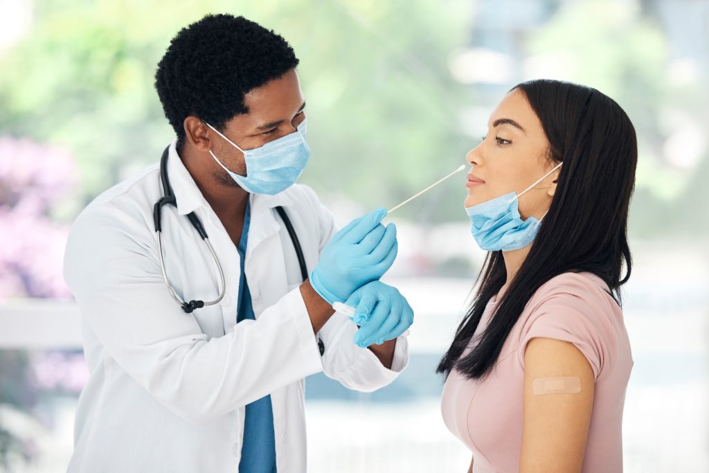 Doctor, patient and covid pcr, test and appointment in medical hospital with face mask for safety a