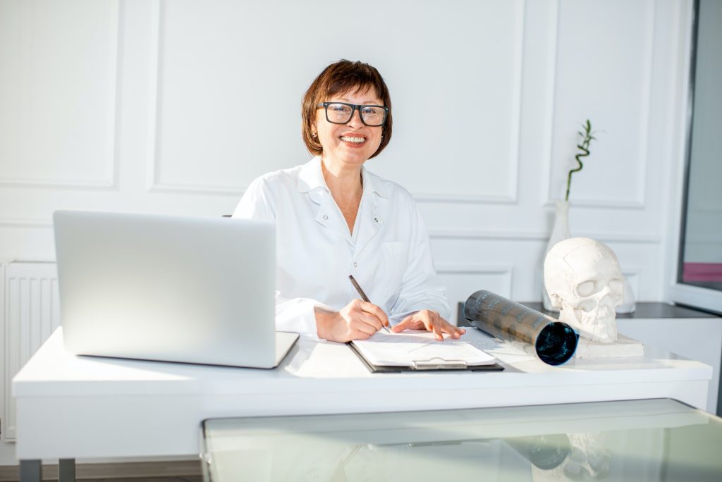 Senior woman doctor in the office