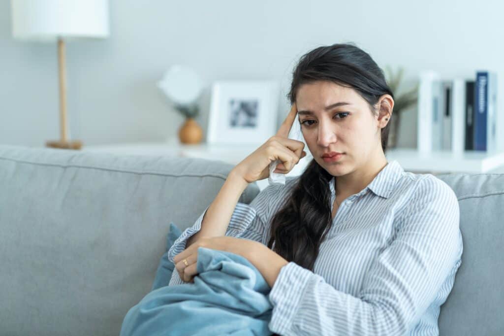Asian unhappy woman having psychological problem feeling anxiety depression, upset and grief