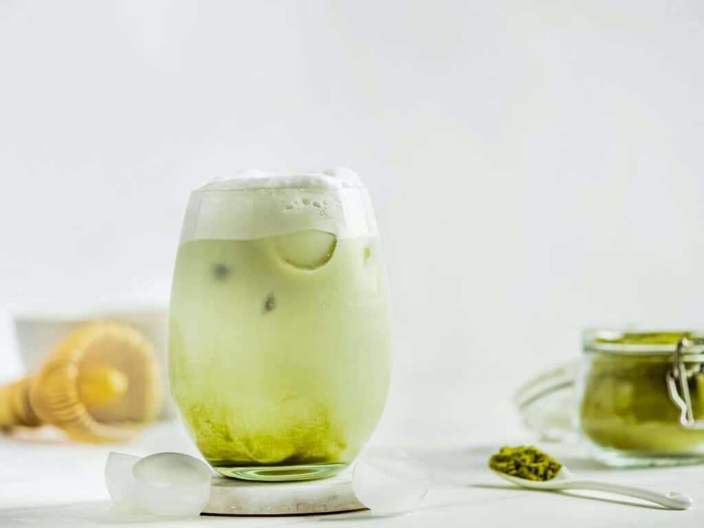 Iced Matcha Latte Tea with whipped cream