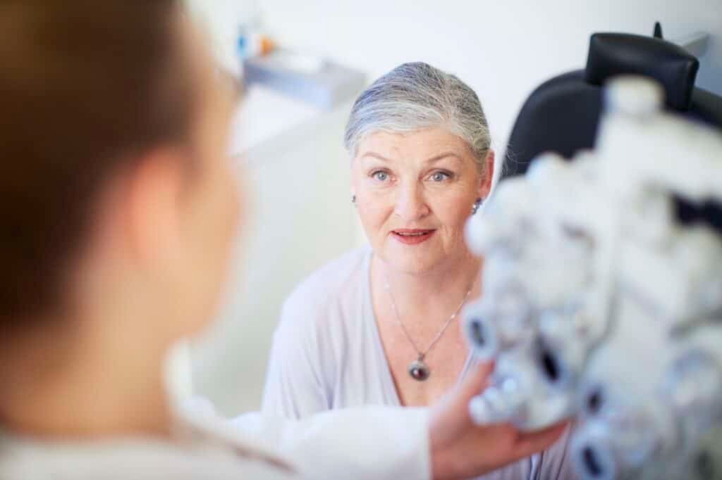 Senior woman at the eye doctor