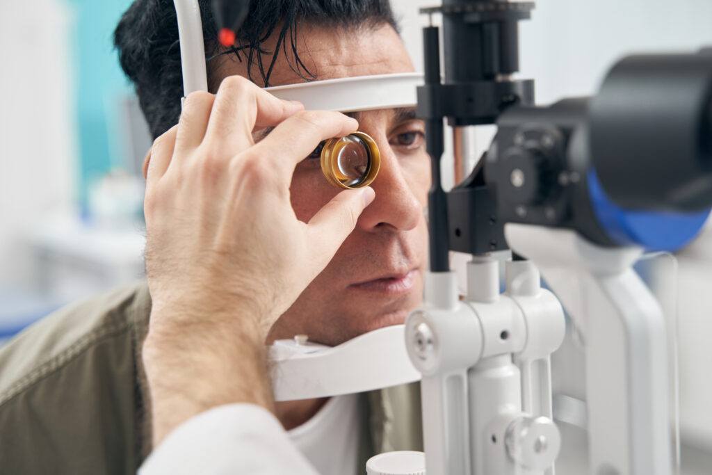Male having medical eye examination in hospital